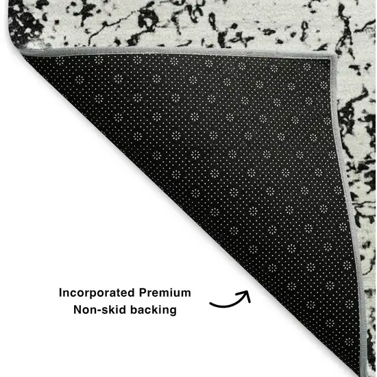 Black And Ivory Abstract Washable Area Rug With UV Protection Photo 8