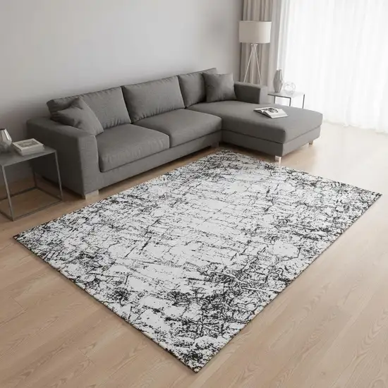 Black And Ivory Abstract Washable Area Rug With UV Protection Photo 2