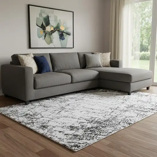 Black And Ivory Abstract Washable Area Rug With UV Protection Photo 1