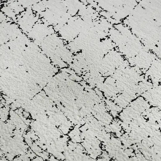 Black And Ivory Abstract Washable Area Rug With UV Protection Photo 8