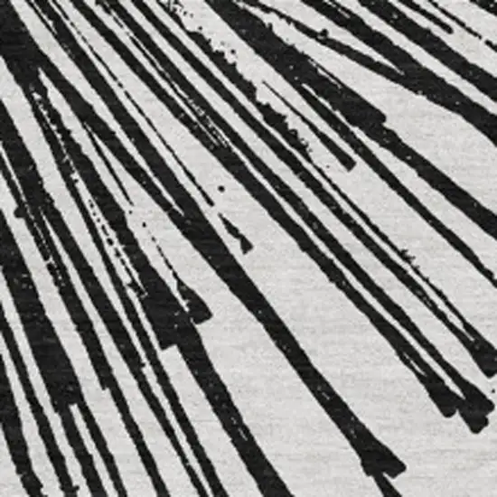 Black And Ivory Abstract Washable Area Rug With UV Protection Photo 3