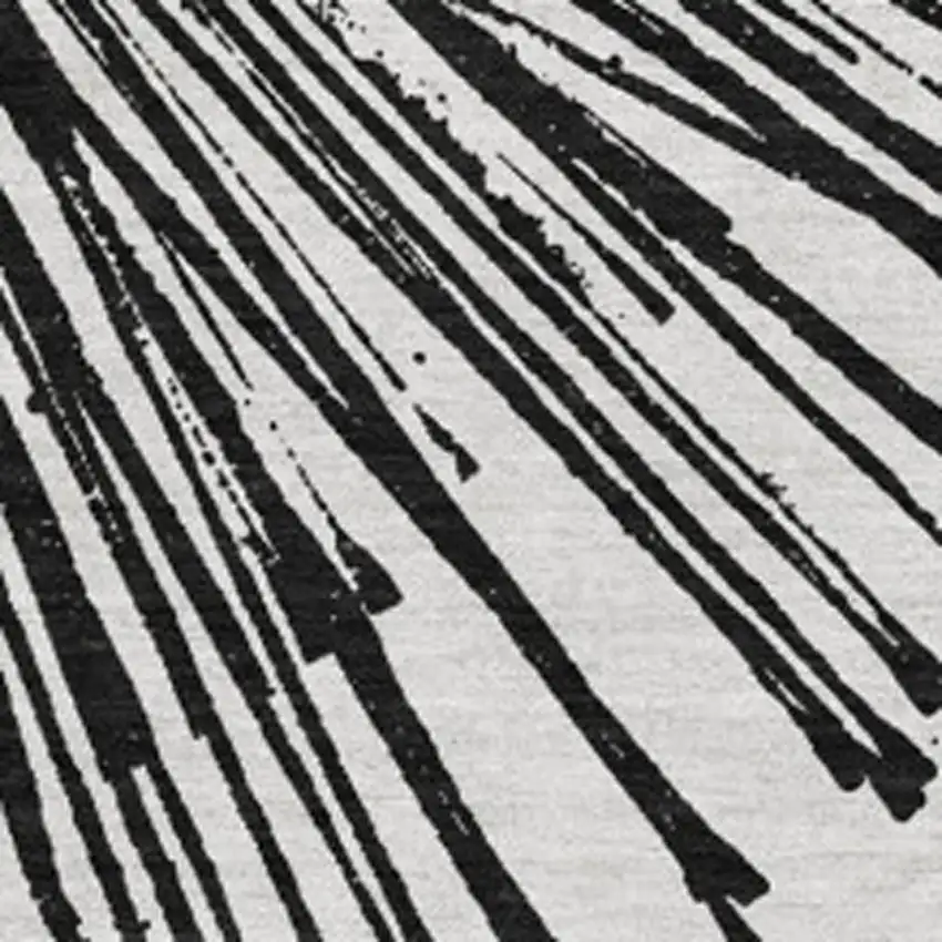 Black And Ivory Abstract Washable Area Rug With UV Protection Photo 3