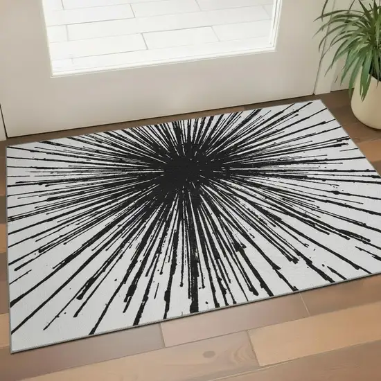Black And Ivory Abstract Washable Area Rug With UV Protection Photo 2