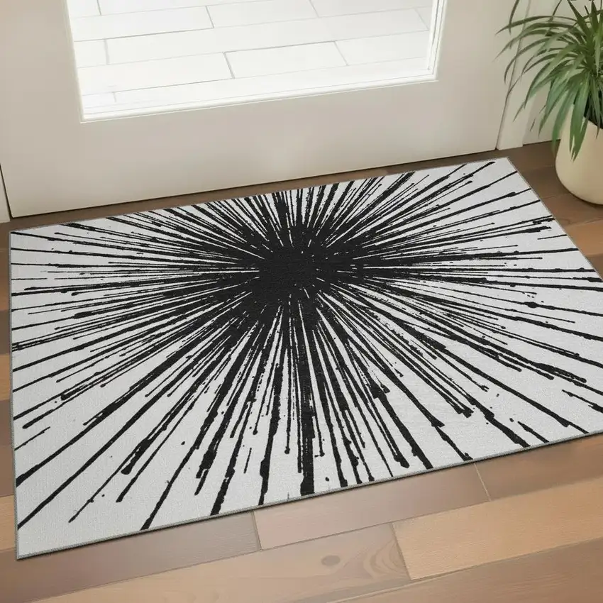 Black And Ivory Abstract Washable Area Rug With UV Protection Photo 2