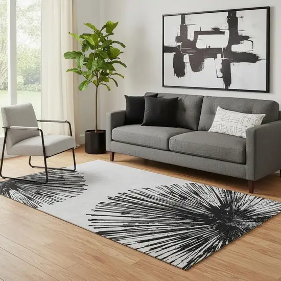 Black And Ivory Abstract Washable Area Rug With UV Protection Photo 1