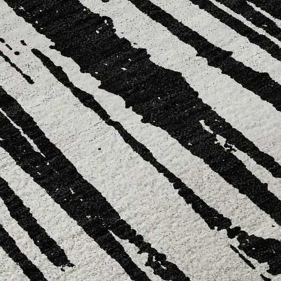 Black And Ivory Abstract Washable Area Rug With UV Protection Photo 4
