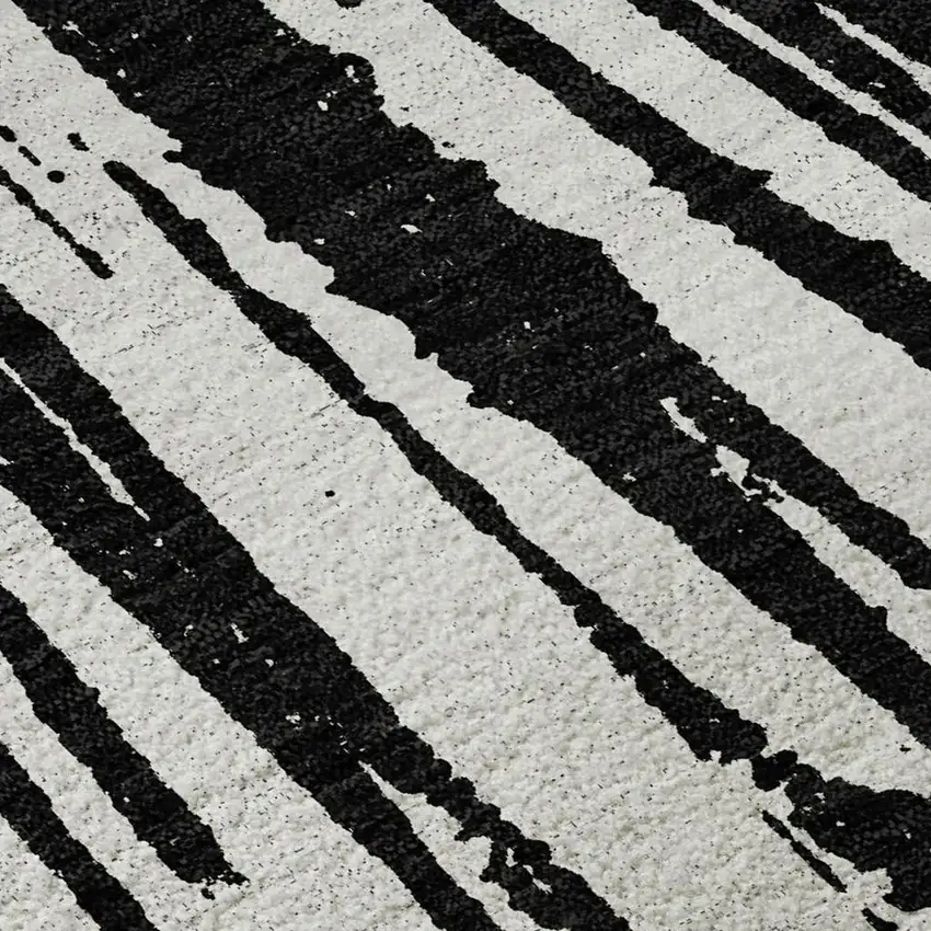 Black And Ivory Abstract Washable Area Rug With UV Protection Photo 4