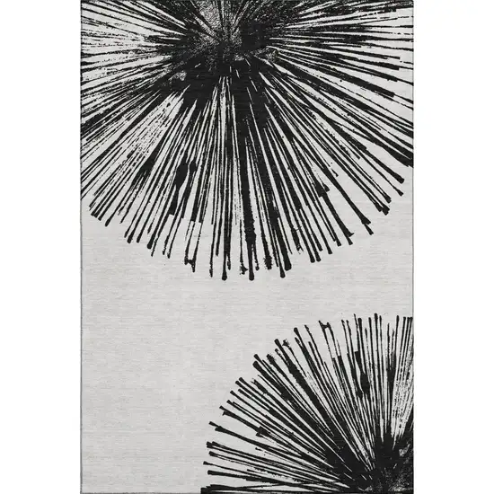 Black And Ivory Abstract Washable Area Rug With UV Protection Photo 1