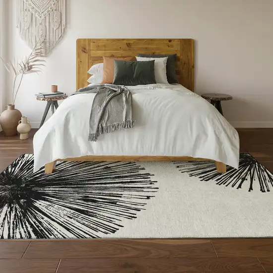 Black And Ivory Abstract Washable Area Rug With UV Protection Photo 4