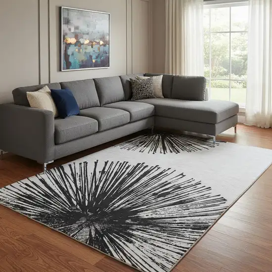 Black And Ivory Abstract Washable Area Rug With UV Protection Photo 1