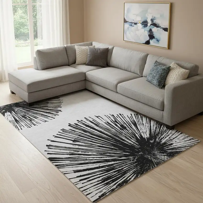 Black And Ivory Abstract Washable Area Rug With UV Protection Photo 1