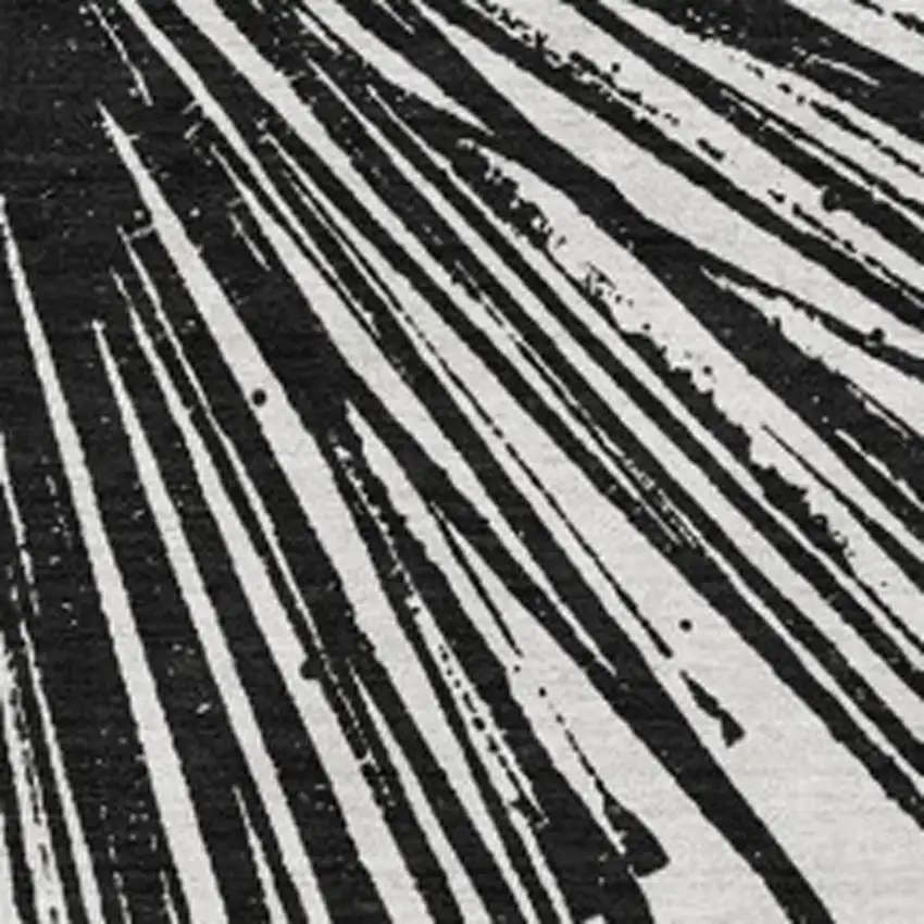 Black And Ivory Abstract Washable Area Rug With UV Protection Photo 3