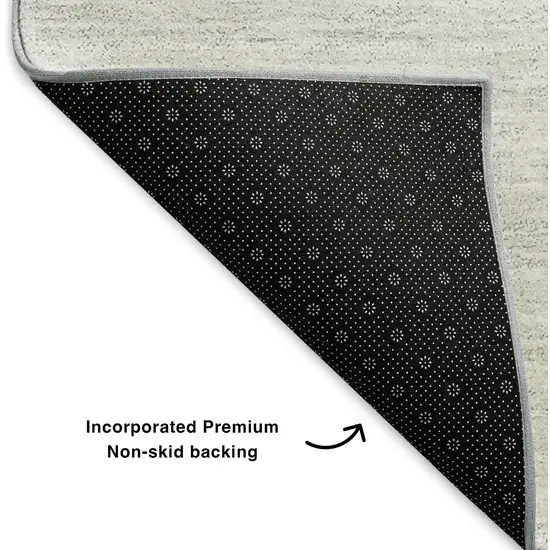 Black And Ivory Abstract Washable Area Rug With UV Protection Photo 6