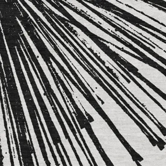 Black And Ivory Abstract Washable Area Rug With UV Protection Photo 4