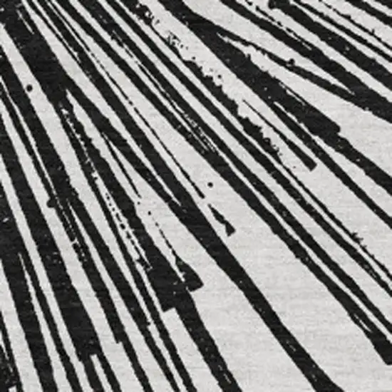 Black And Ivory Abstract Washable Area Rug With UV Protection Photo 3