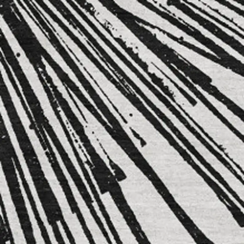 Black And Ivory Abstract Washable Area Rug With UV Protection Photo 3