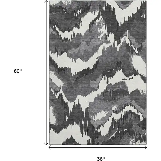 Black And Ivory Abstract Washable Area Rug With UV Protection Photo 3