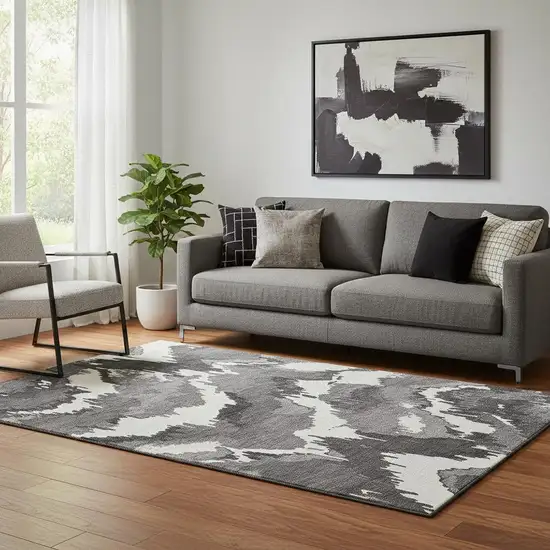 Black And Ivory Abstract Washable Area Rug With UV Protection Photo 1