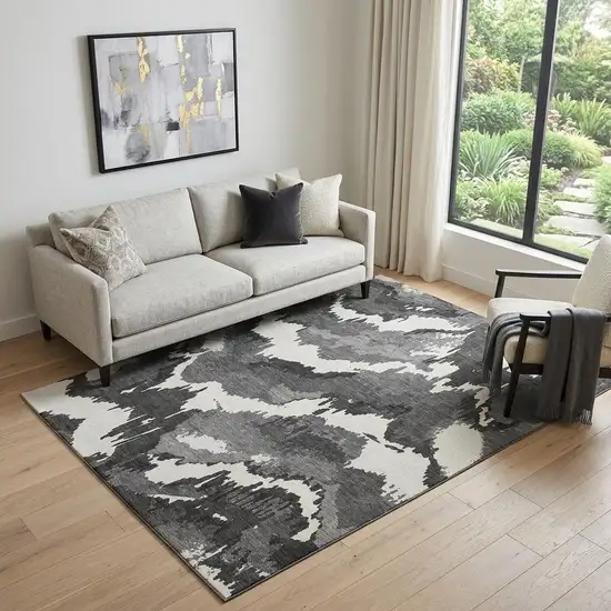 Black And Ivory Abstract Washable Area Rug With UV Protection Photo 1