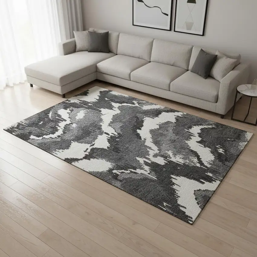Black And Ivory Abstract Washable Area Rug With UV Protection Photo 1