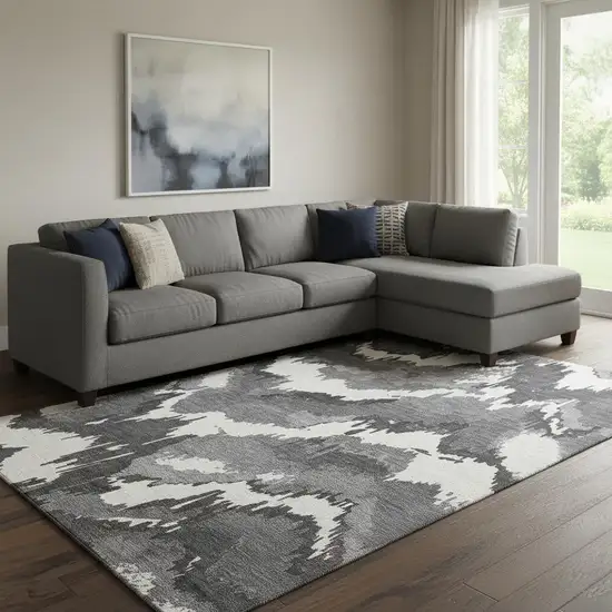 Black And Ivory Abstract Washable Area Rug With UV Protection Photo 1