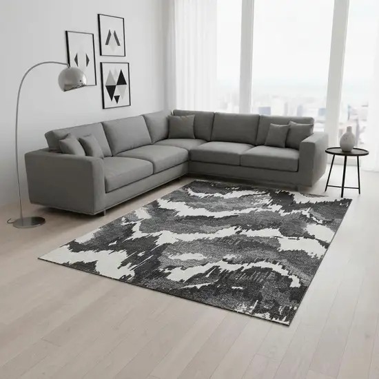Black And Ivory Abstract Washable Area Rug With UV Protection Photo 1