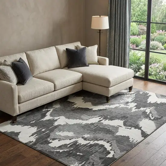 Black And Ivory Abstract Washable Area Rug With UV Protection Photo 1