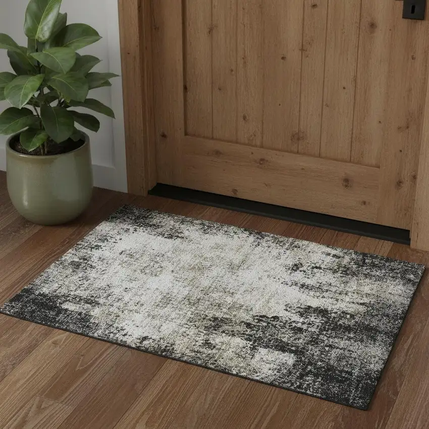 Black And Ivory Abstract Washable Area Rug With UV Protection Photo 1