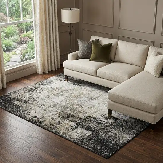 Black And Ivory Abstract Washable Area Rug With UV Protection Photo 1