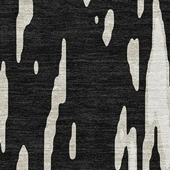 Black And Ivory Abstract Washable Area Rug With UV Protection Photo 3