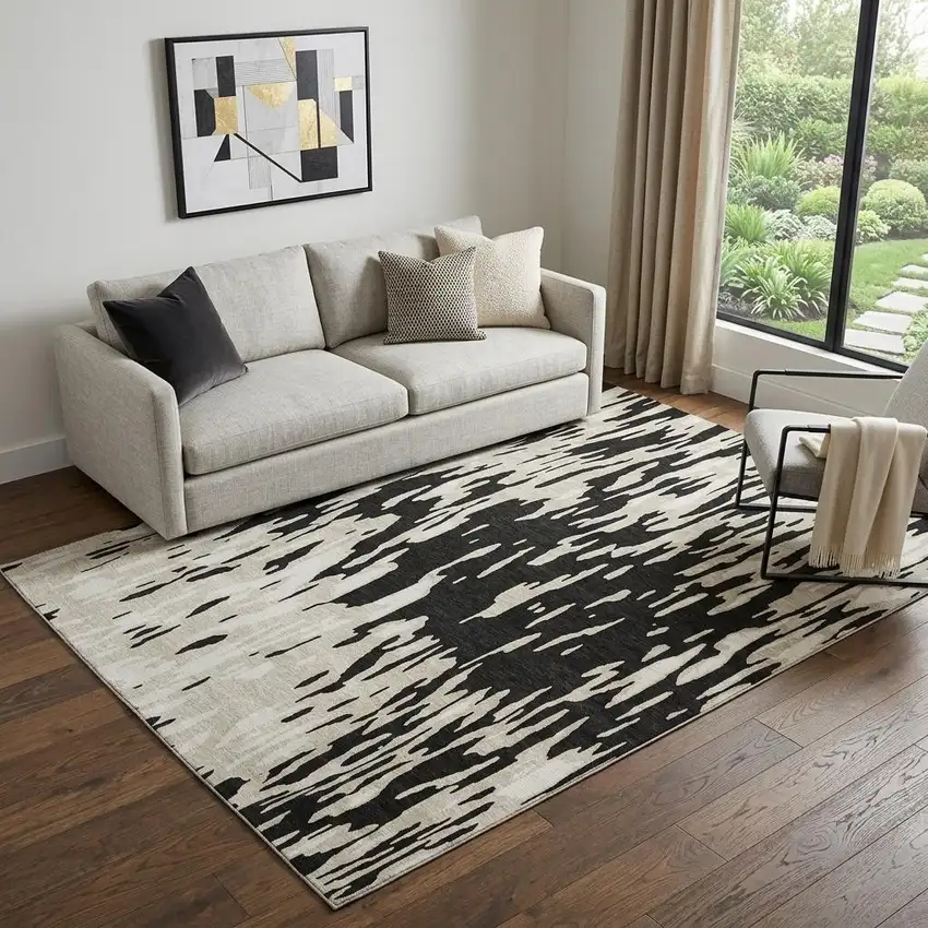 Black And Ivory Abstract Washable Area Rug With UV Protection Photo 1