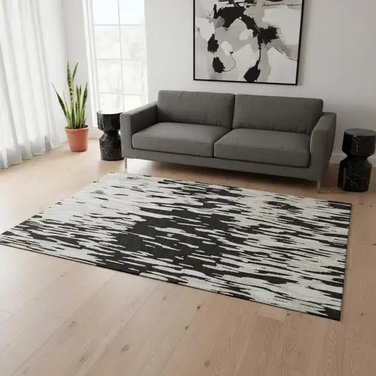 Black And Ivory Abstract Washable Area Rug With UV Protection Photo 2