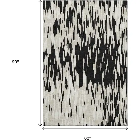 Black And Ivory Abstract Washable Area Rug With UV Protection Photo 9