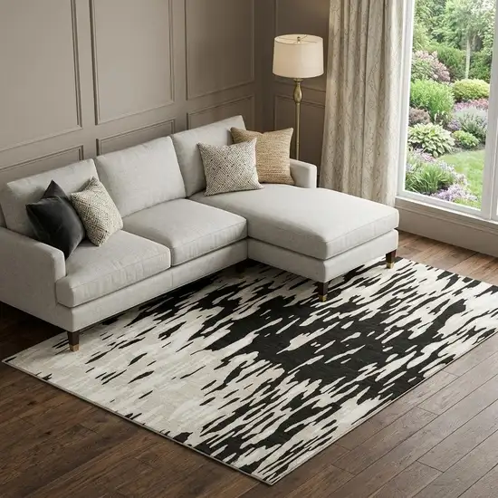 Black And Ivory Abstract Washable Area Rug With UV Protection Photo 1
