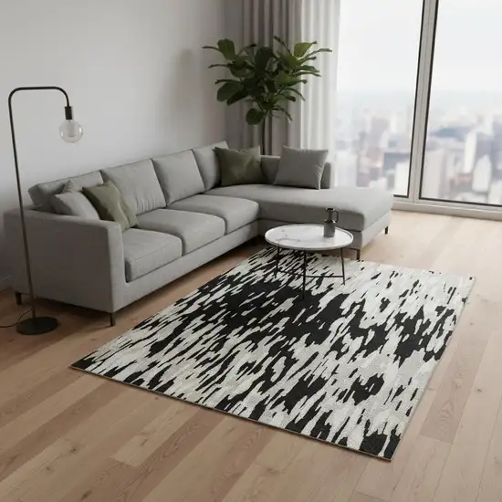 Black And Ivory Abstract Washable Area Rug With UV Protection Photo 2