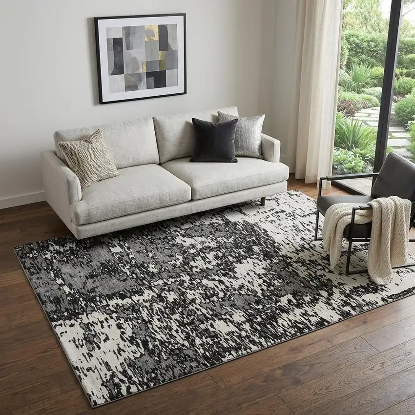 Black And Ivory Abstract Washable Area Rug With UV Protection Photo 1