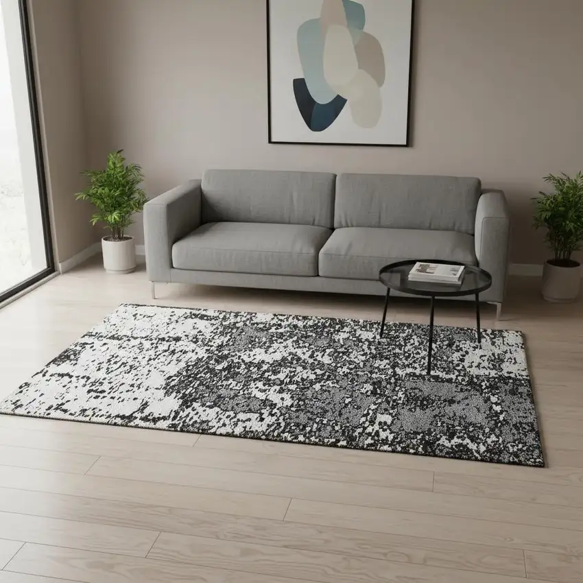 Black And Ivory Abstract Washable Area Rug With UV Protection Photo 2