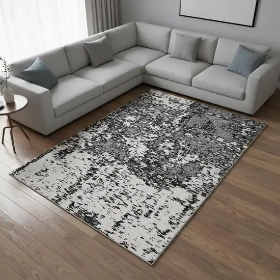 Black And Ivory Abstract Washable Area Rug With UV Protection Photo 2