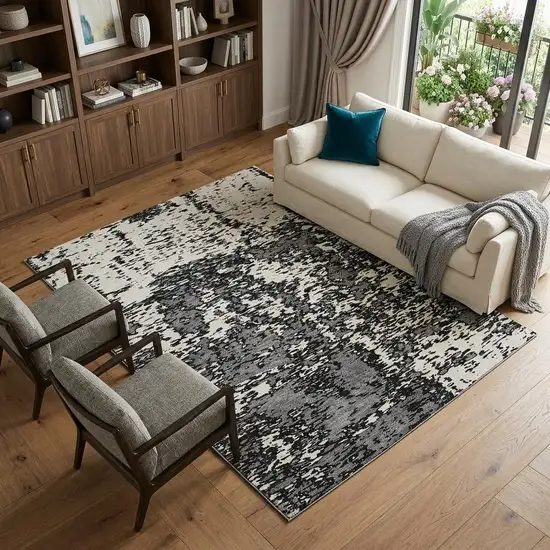 Black And Ivory Abstract Washable Area Rug With UV Protection Photo 1