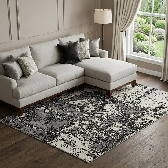 Black And Ivory Abstract Washable Area Rug With UV Protection Photo 1