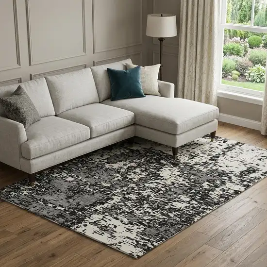 Black And Ivory Abstract Washable Area Rug With UV Protection Photo 1