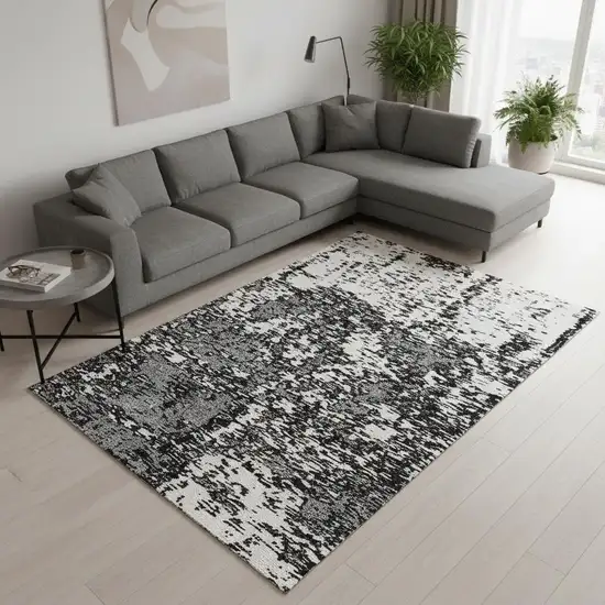 Black And Ivory Abstract Washable Area Rug With UV Protection Photo 2