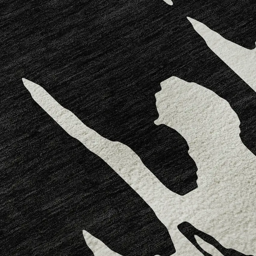 Black And Ivory Abstract Washable Area Rug With UV Protection Photo 1