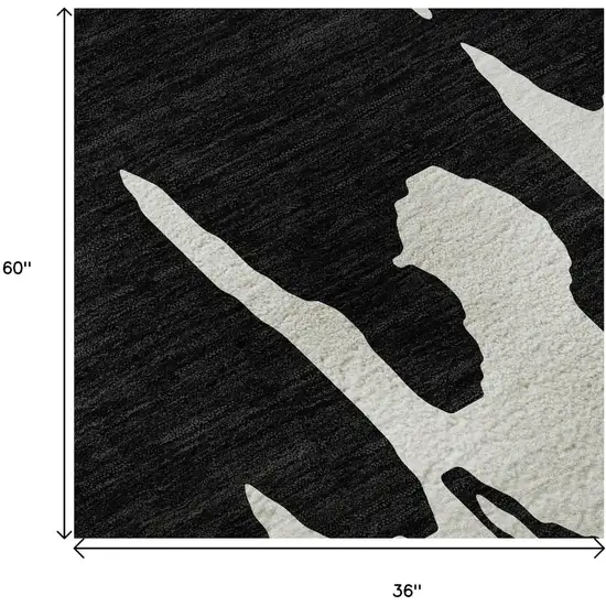 Black And Ivory Abstract Washable Area Rug With UV Protection Photo 9