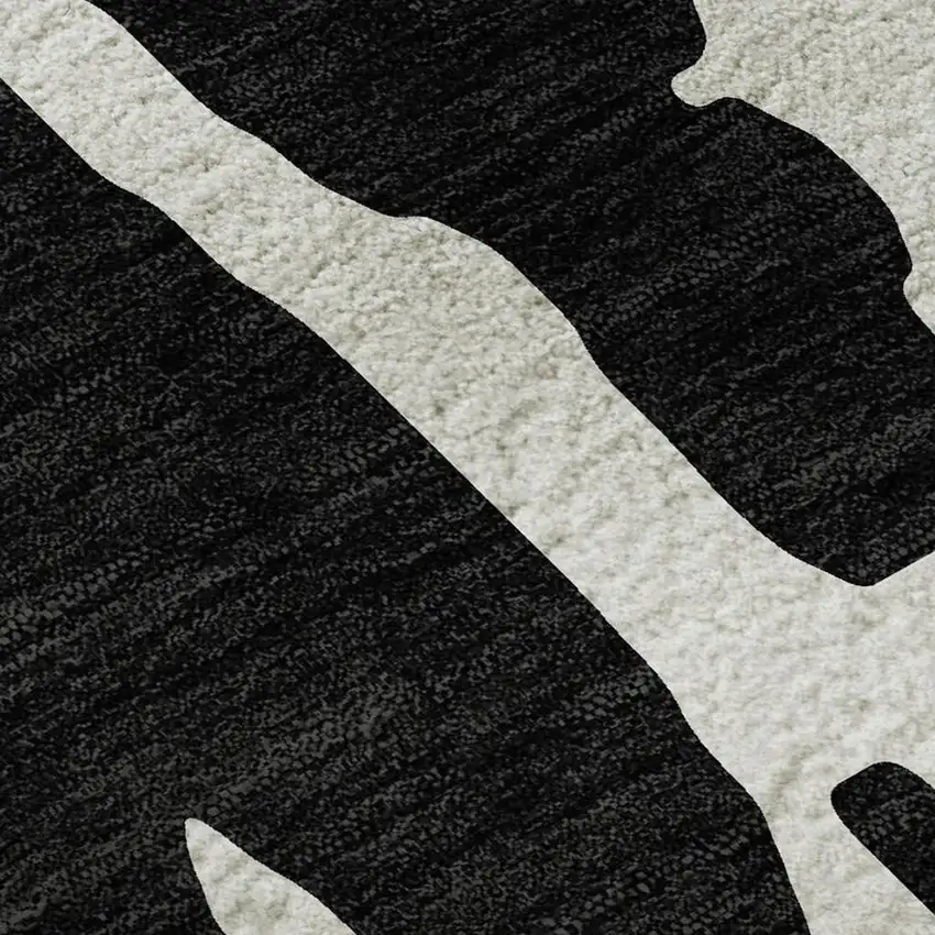 Black And Ivory Abstract Washable Area Rug With UV Protection Photo 2