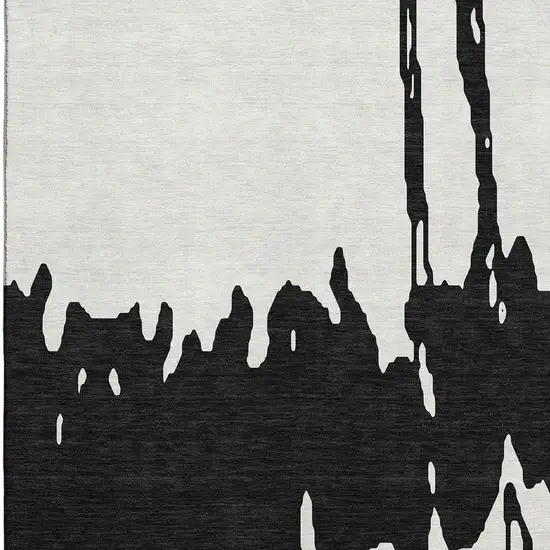 Black And Ivory Abstract Washable Area Rug With UV Protection Photo 3