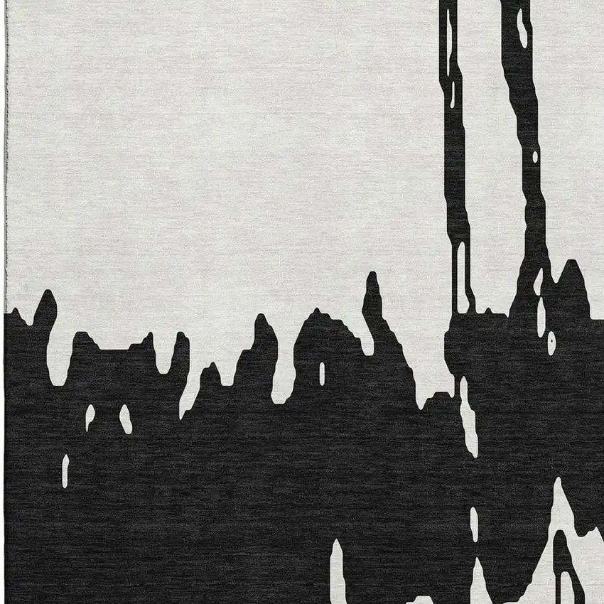 Black And Ivory Abstract Washable Area Rug With UV Protection Photo 3