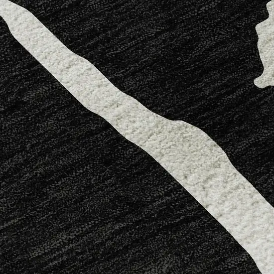 Black And Ivory Abstract Washable Area Rug With UV Protection Photo 2