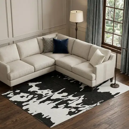 Black And Ivory Abstract Washable Area Rug With UV Protection Photo 1