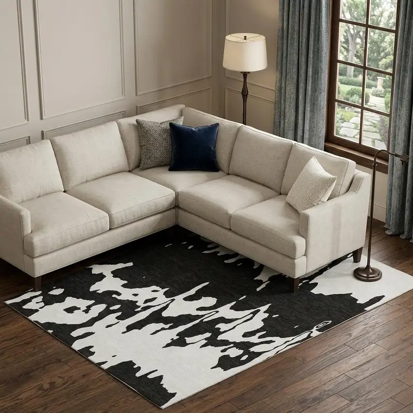 Black And Ivory Abstract Washable Area Rug With UV Protection Photo 1